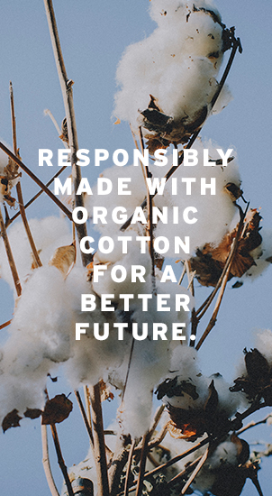 Image Description: The image background shows a close-up image of cotton plants with blue sky behind. There is white text that reads: 'Responsibly made with organic cotton for a better future.'