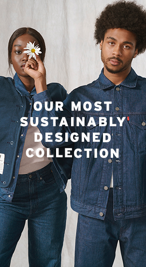 Image Description: The image background is an image of two people wearing double denim outfits from the Wellthread collection. The person on the right is holding a white and yellow daisy flower in front of the left person's eye. There is white text that reads: 'Our most sustainably designed collection.'
